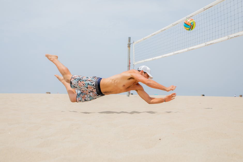 Man Playing Beach Volleyball 